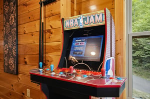 Challenge your friends to classic arcade basketball right in your rental. This fullsize NBA Jam machine brings nostalgic fun to your mountain getaway.