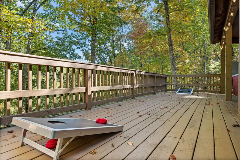 Cornhole game on deck