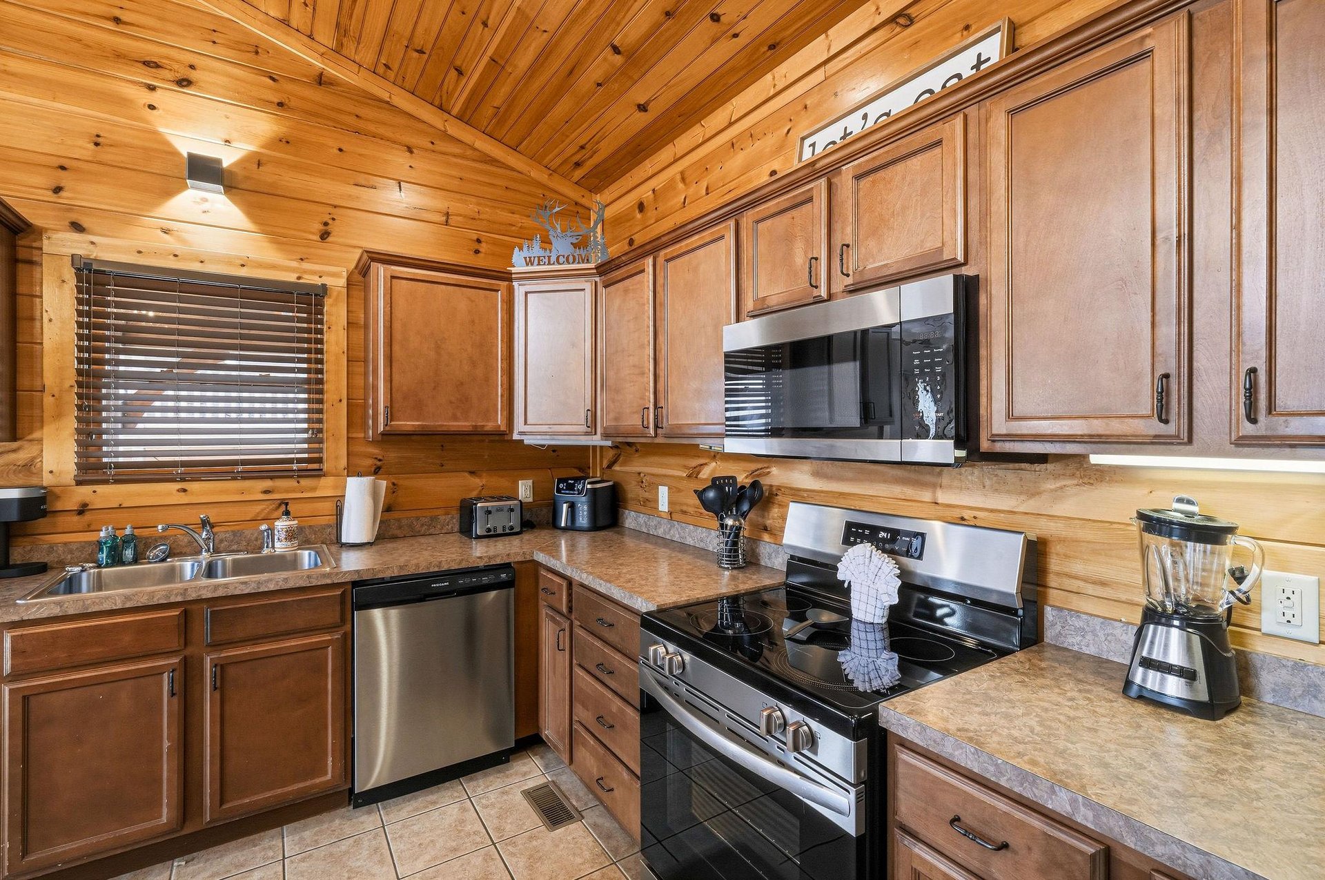 Craft memorable meals in your cozy cabin kitchen, complete with modern appliances and rustic charm.