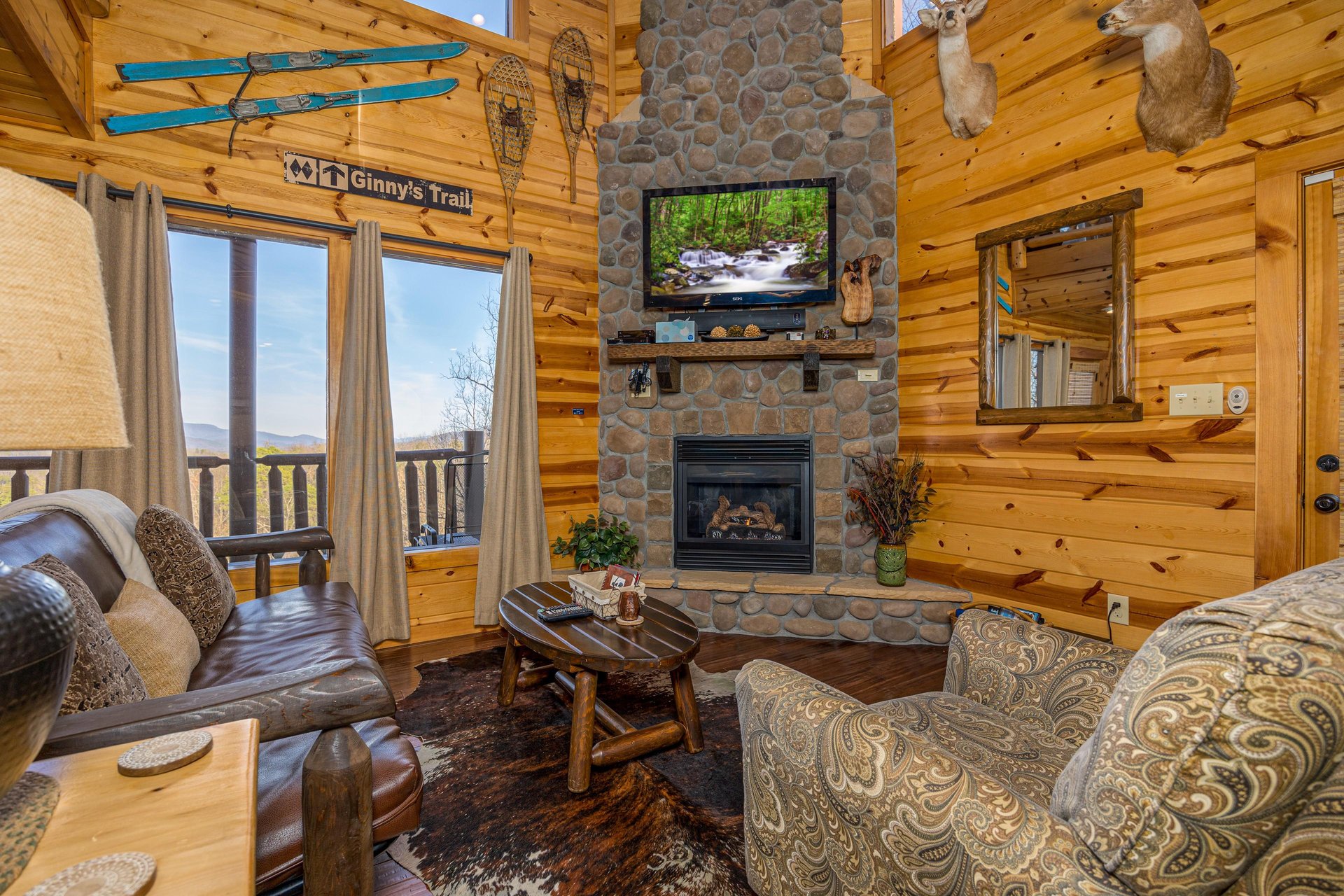 Living room with stone fireplace