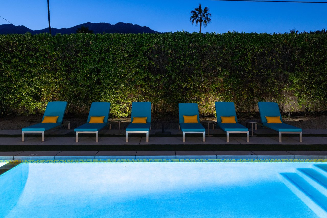 Evenings by the pool offer perfect tranquility, with comfortable loungers and mountain views creating your ideal sunset retreat.