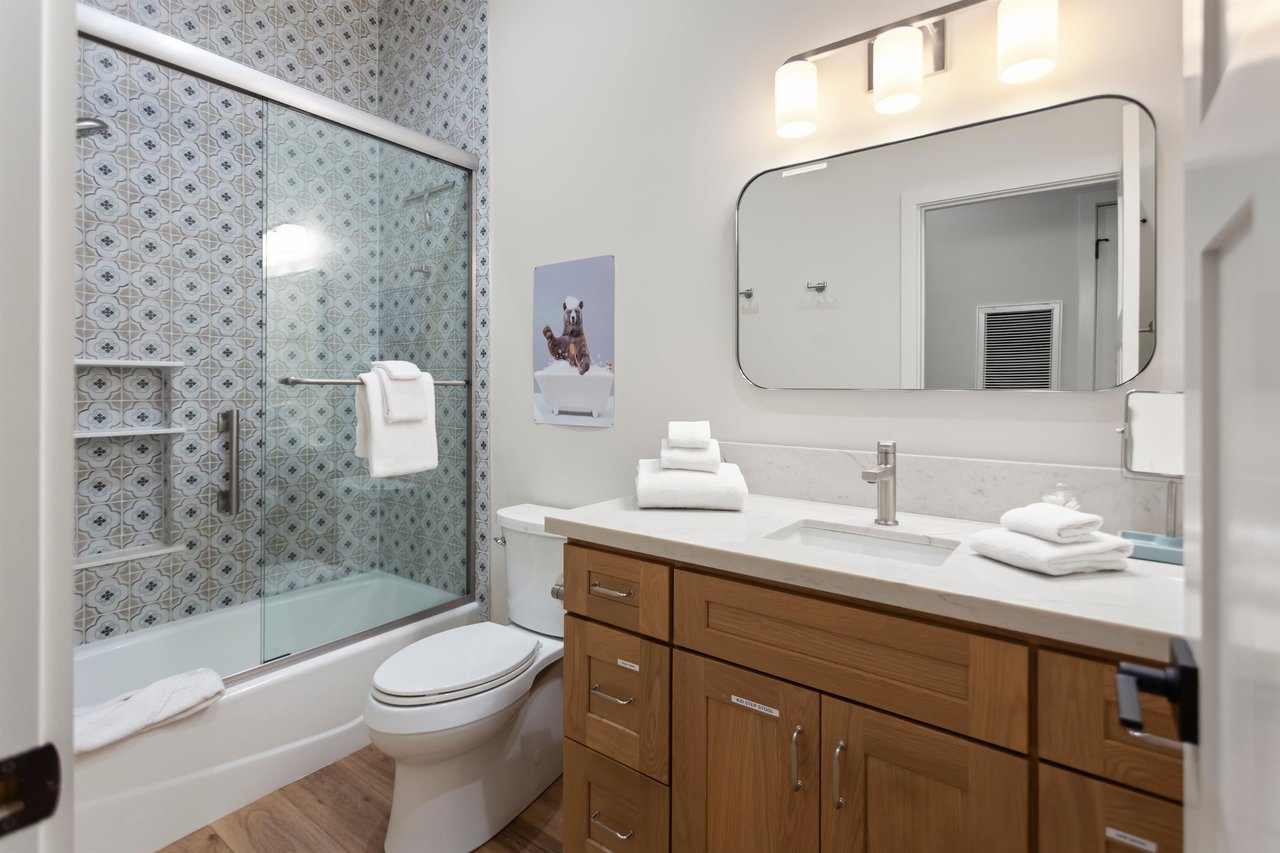 Downstairs bathroom features a shower and tub.