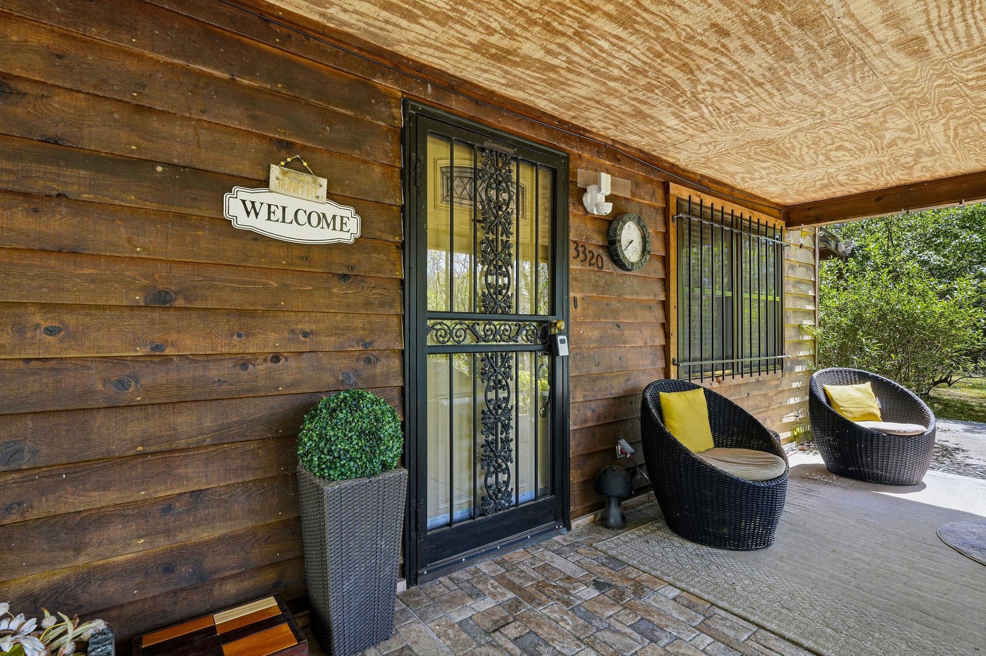 Your welcoming entrance sets the perfect tone with cozy seating where you can savor morning coffee.