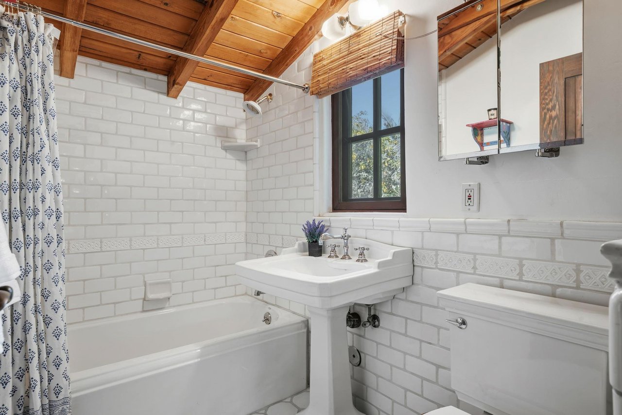 Bathroom with showertub combination.