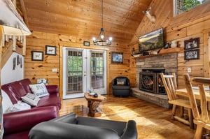 fireplace, TV, sofa bed and balcony access to hot tub