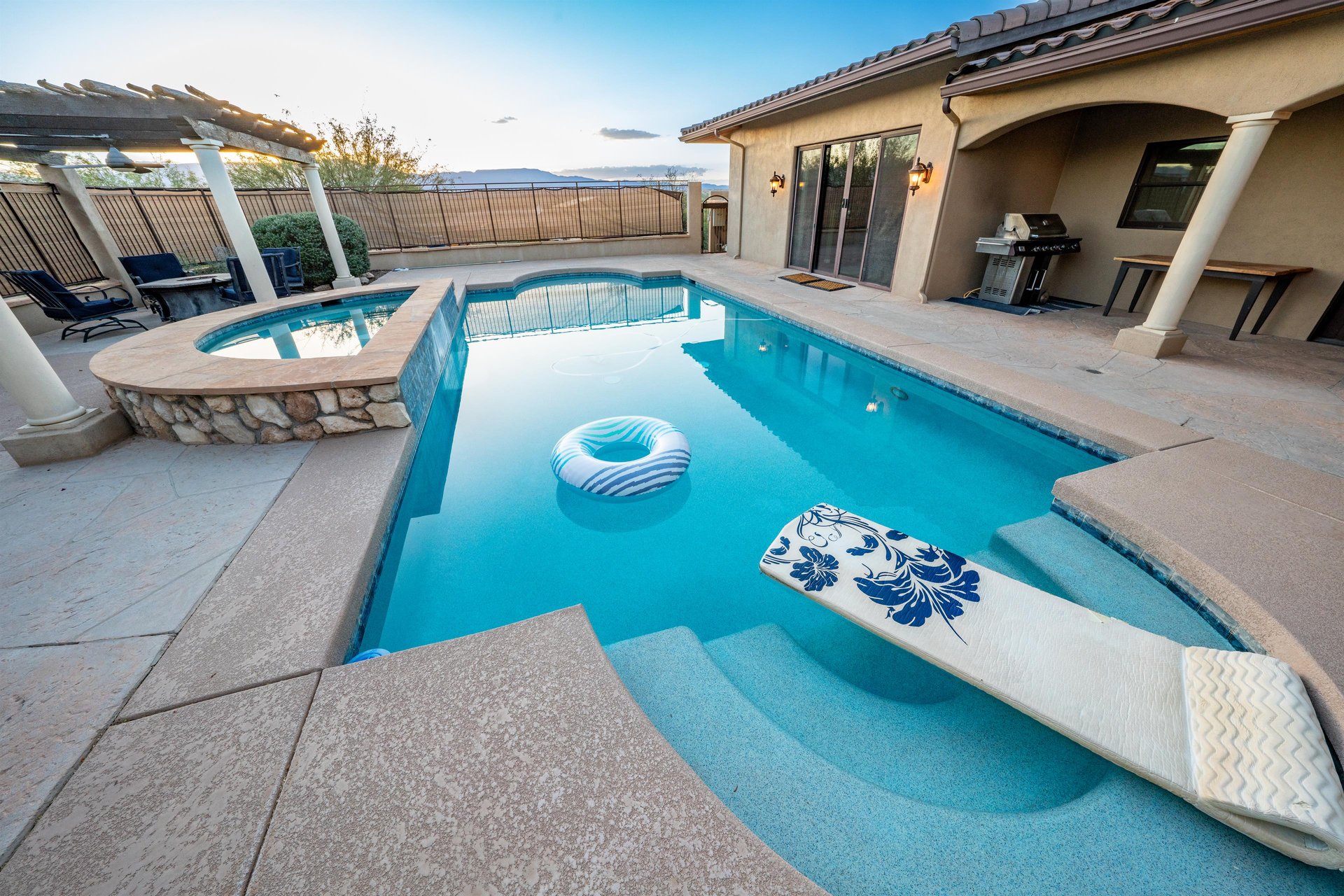Walking Out Of The Living Room Leads You Straight To the Pool And Spa