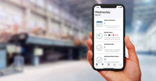 Hands holding smartphone with digital work order