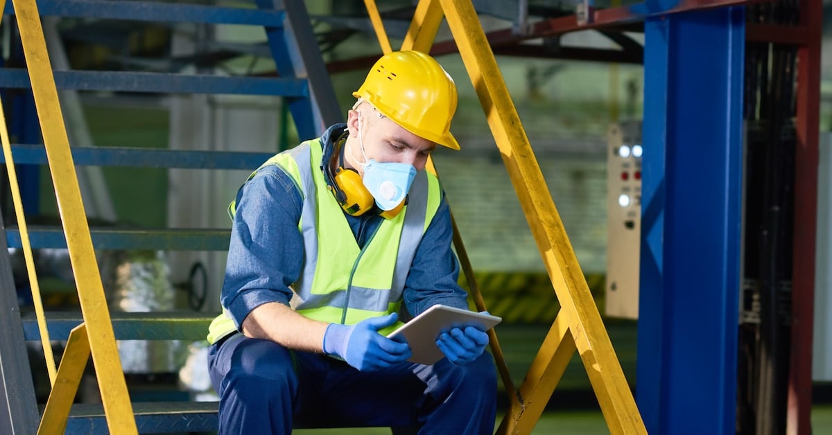Plant worker using digital tablet