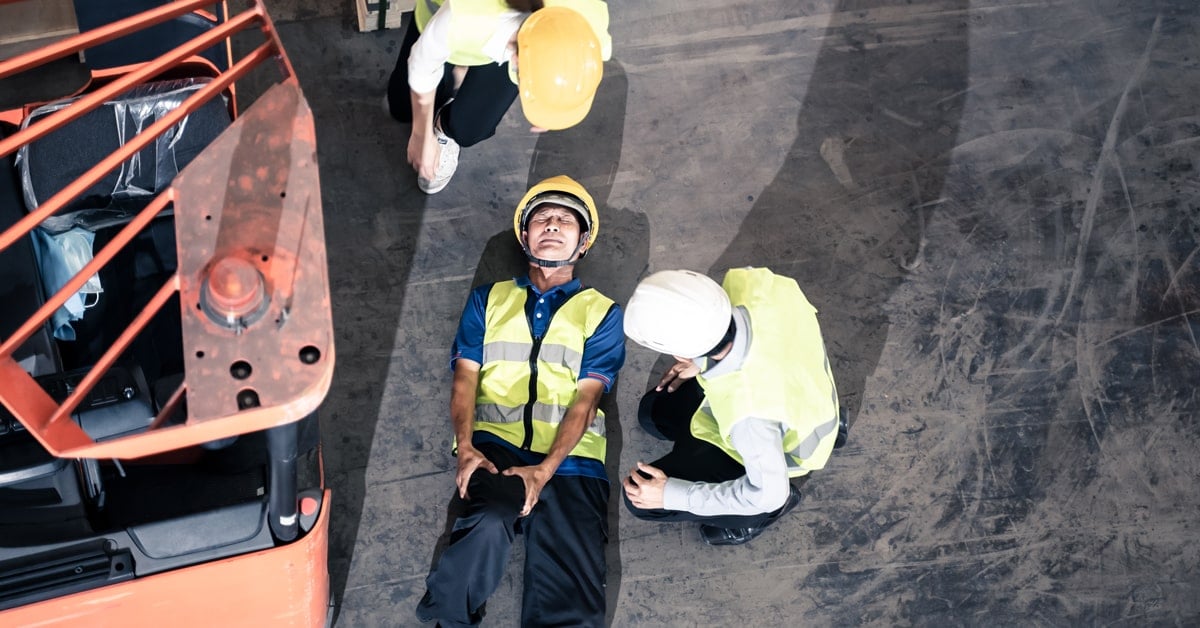Asian man worker had accident broken his leg lying on the floor