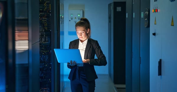 IT engineer specialist working in network server room