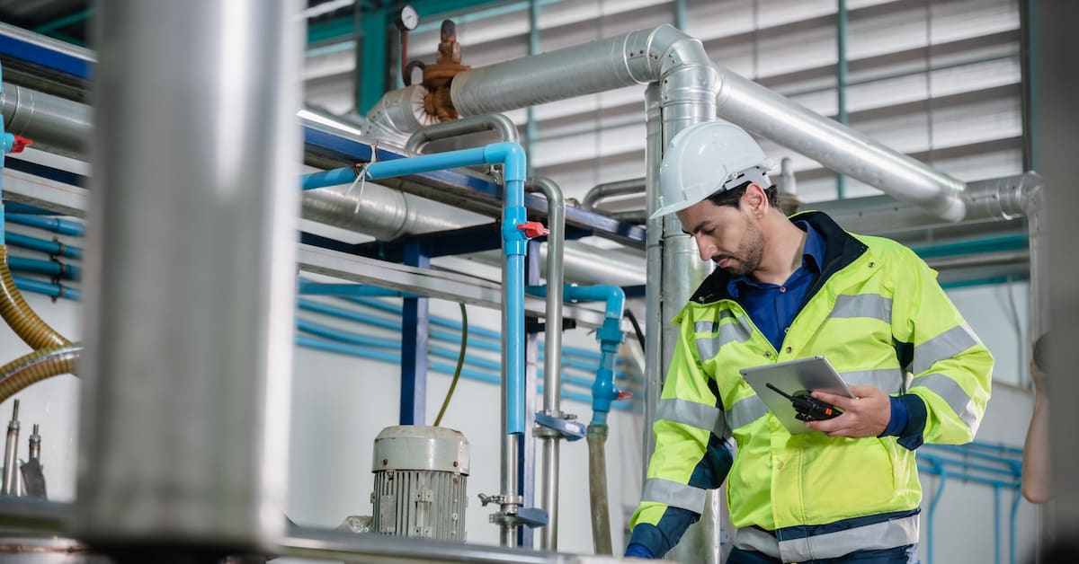 Technician performing an equipment inspection
