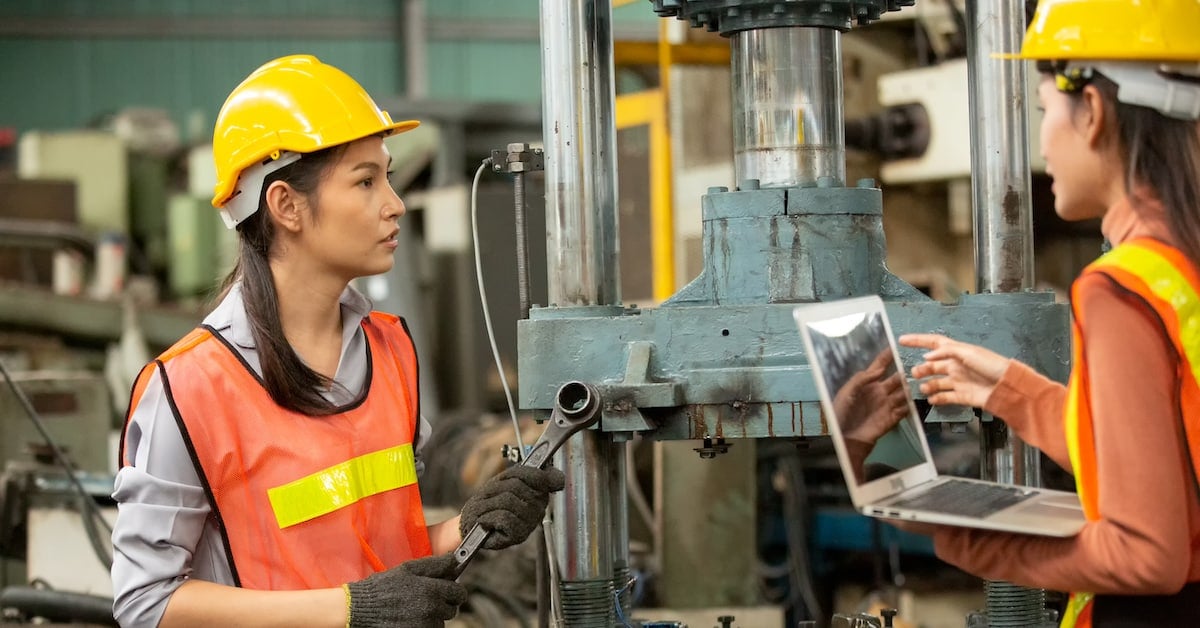 Industrial factory worker working in metal manufacturing