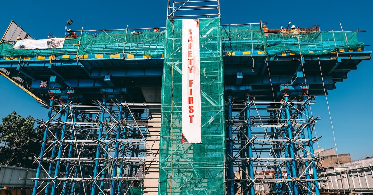 Safety first poster on construction site