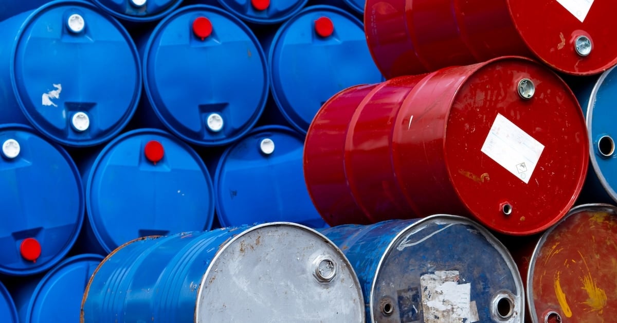 Old chemical barrels - blue and red oil drum steel