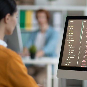 Analyst reviewing code