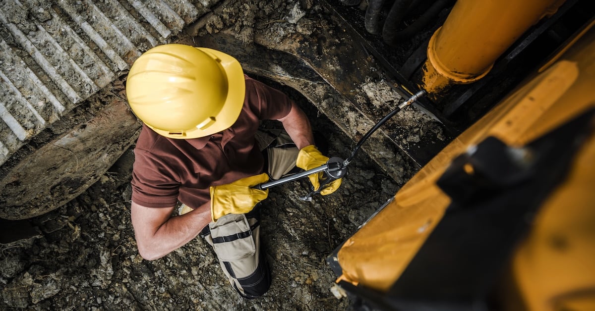 Greasing points inside heavy equipment crawler