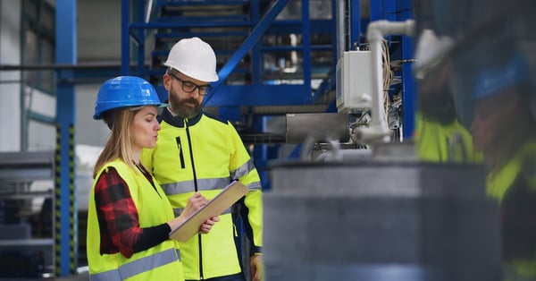 Engineering manager and mechanic worker doing routine maintenance