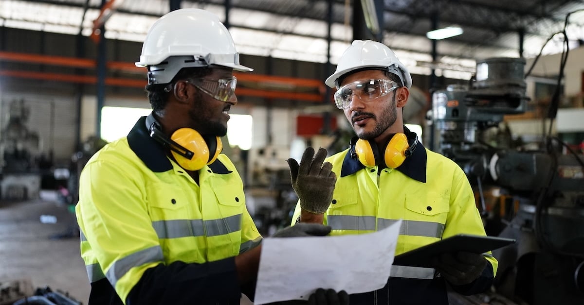 Industrial factory worker working in metal manufacturing