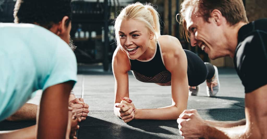 Team members exercising together