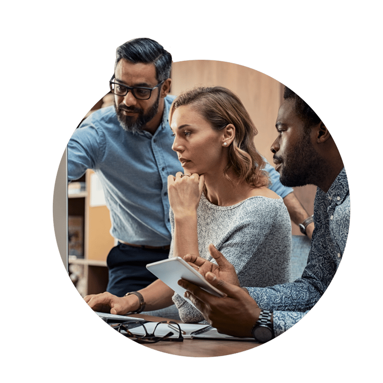 team looking at computer at a career move