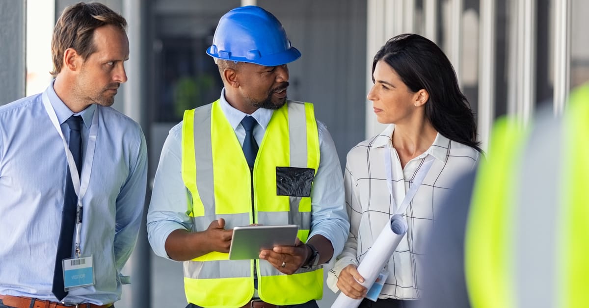 Engineer and architects at construction site