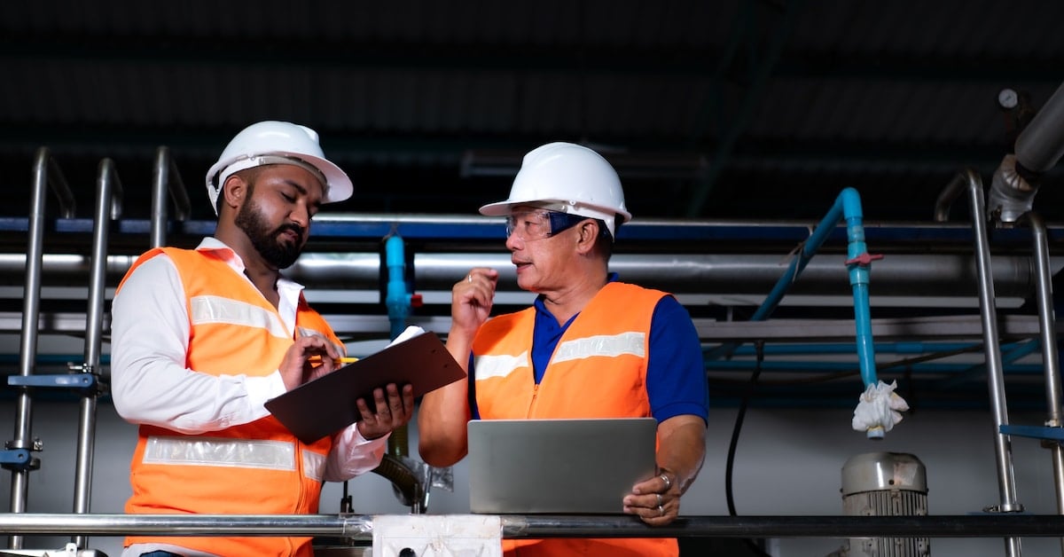 Chief engineer of a mechanical plant inspecting equipment