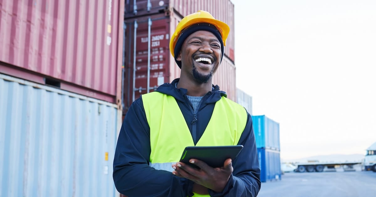 Logistics tablet and man planning shipping