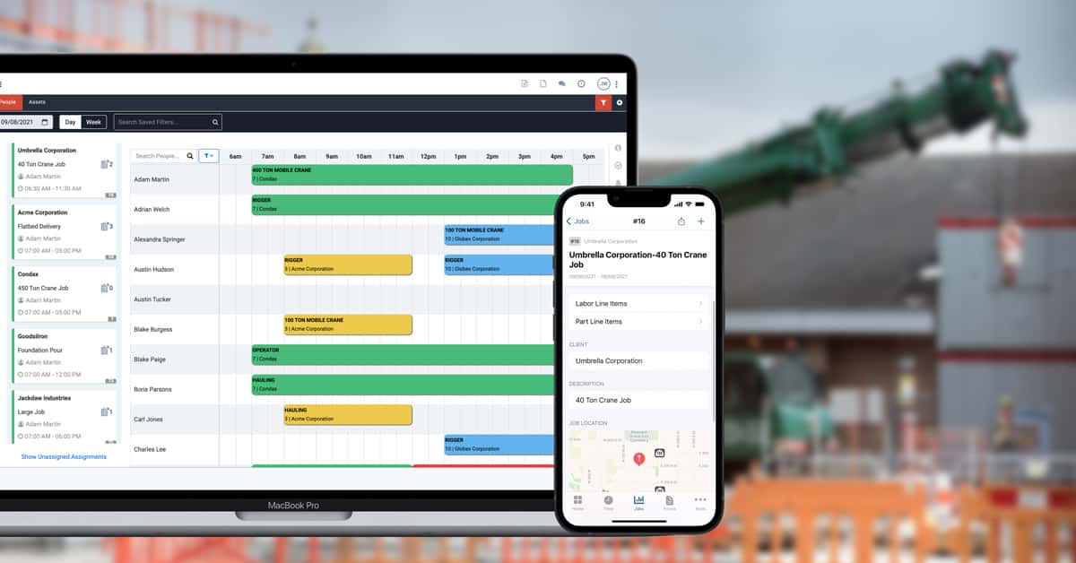 Mobile telescoping hydraulic crane at a construction site