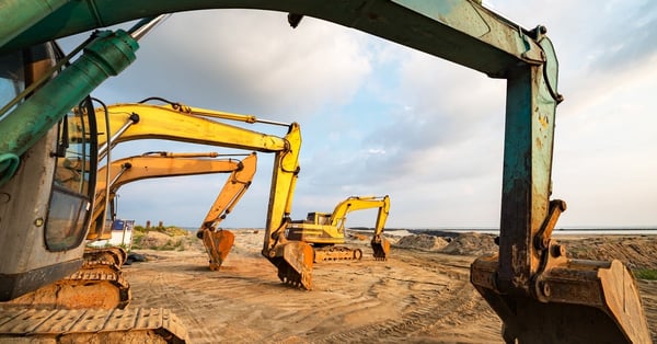 Excavator sitting idle on a job site