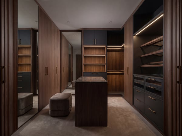 Custom built-in joinery and walk-in wardrobe by The Walls