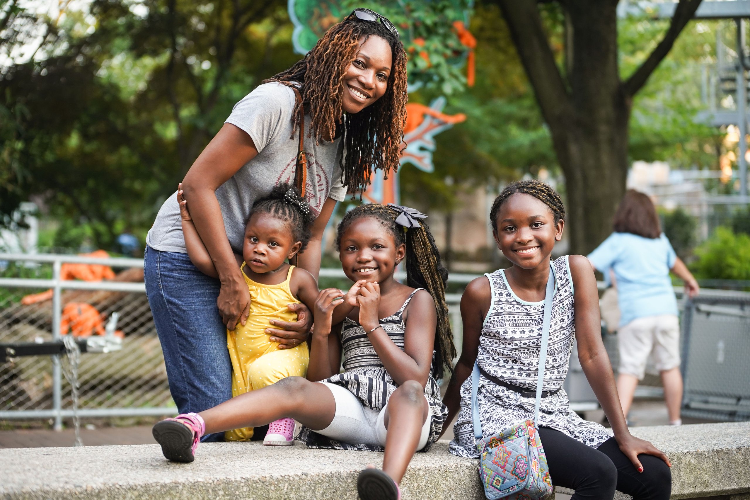 A family of four visits the Philadelphia Zoo.