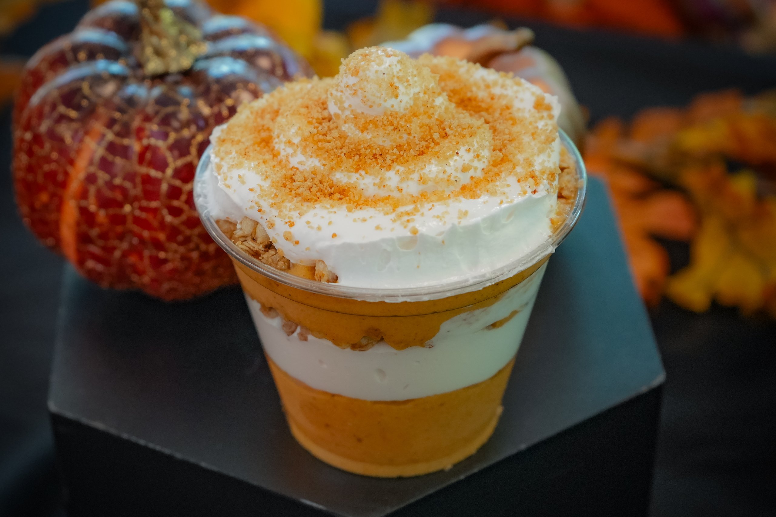 A pumpkin cheesecake parfait made with cheesecake mousse, granola, graham crumble, and whipped cream. Served during Boo at the Zoo at Philadelphia Zoo.