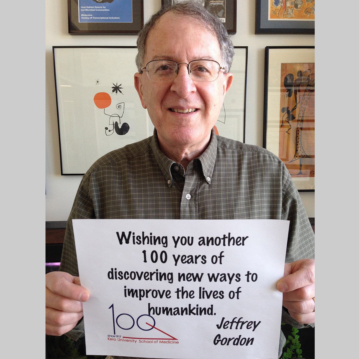 Jeffrey I. Gordon holding a message
