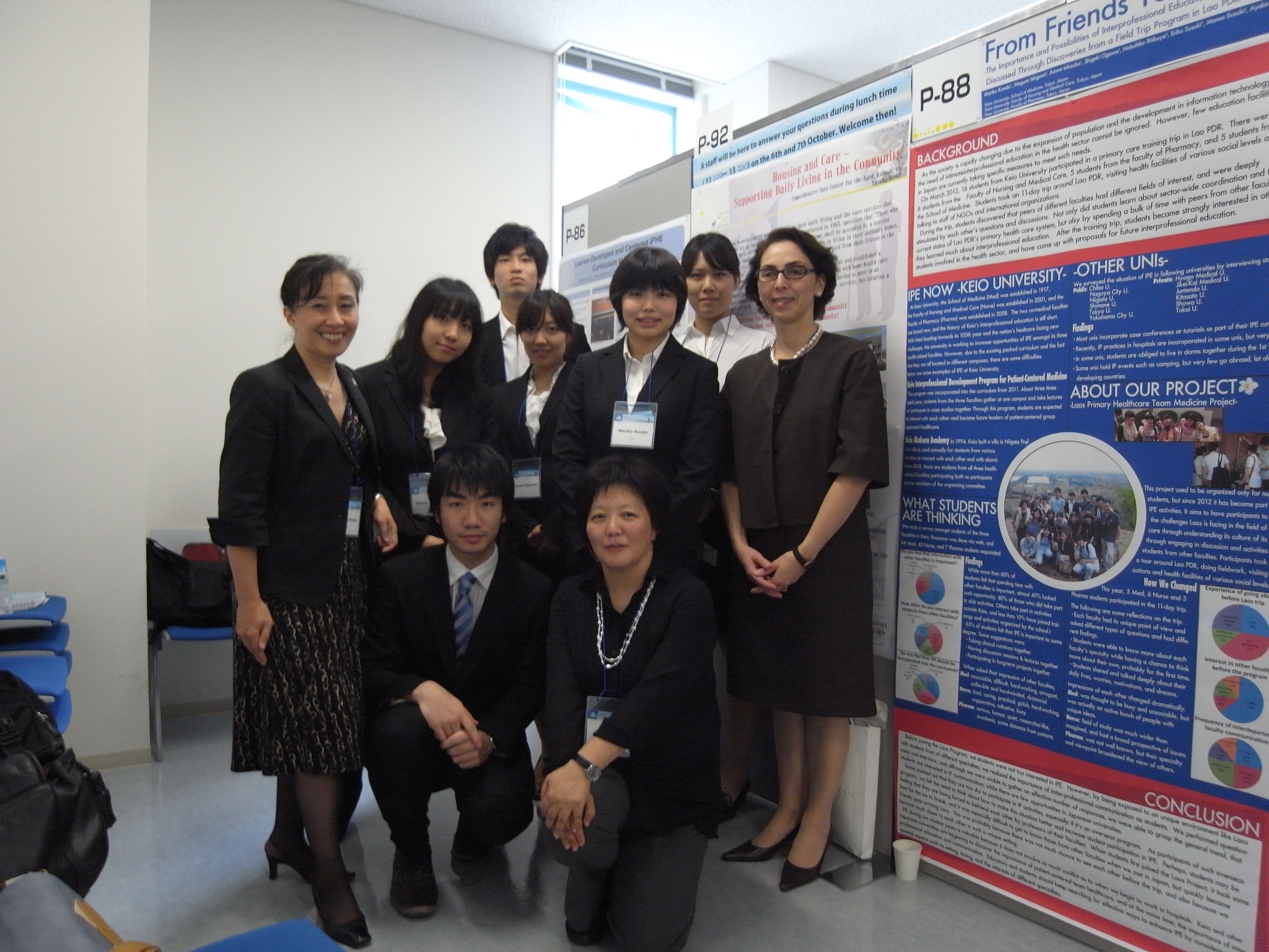 In front of the award-winning poster (Kondo's team)