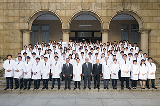 Group photo outside the building