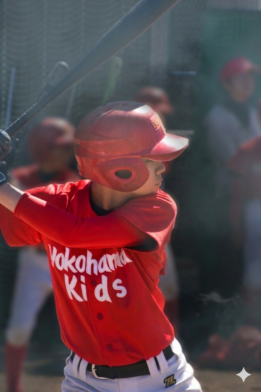 The eldest son standing in the batter's box during his final youth baseball game