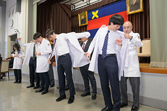 The moment of putting on the white coat