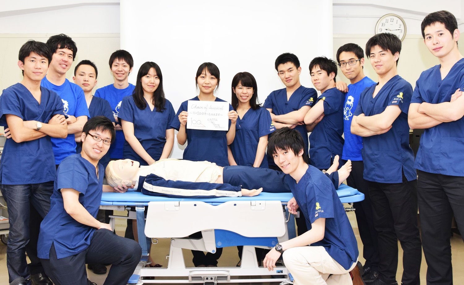 Official Organization KAPPA holding a message