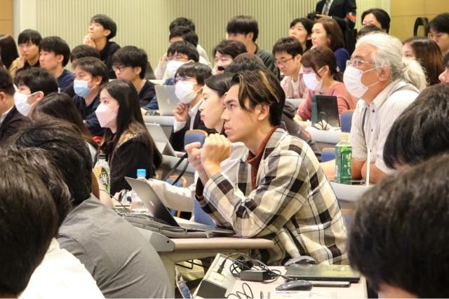 Participants listening intently