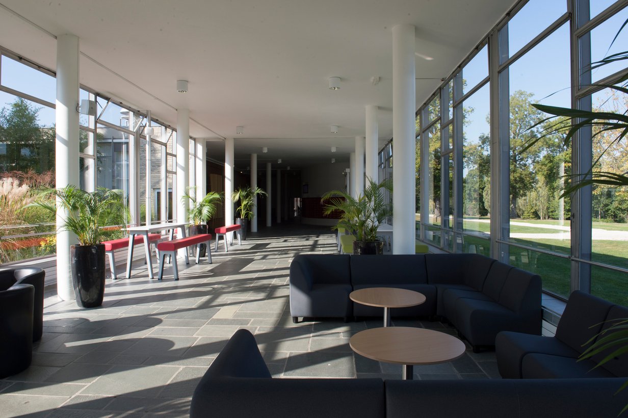 Photo of a lobby with light streaming in