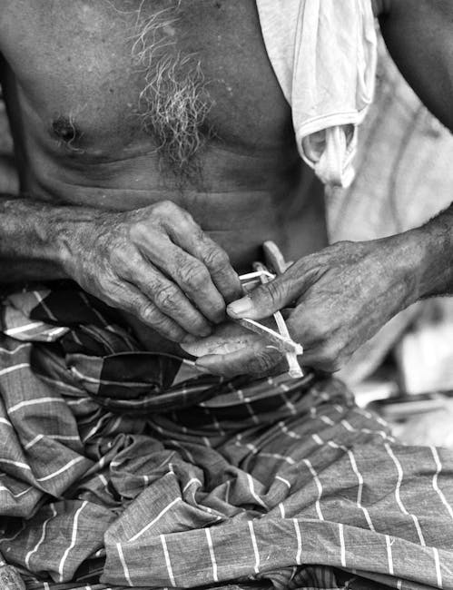 artisan hands weaving Dhaka topi textile Nepal tourists