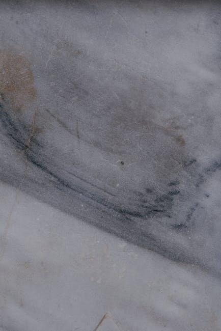 technician installing sensor on marble slab tablet inspection conservation