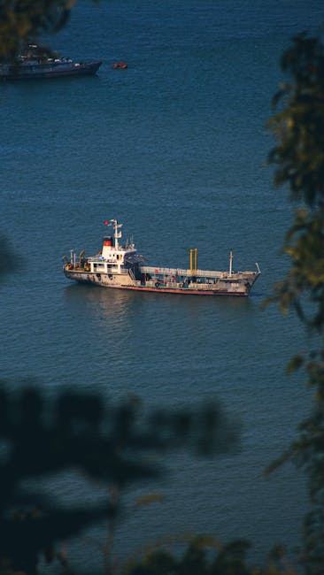 A serene view of a ship sailing on the blue waters of Vũng Tàu, Vietnam.