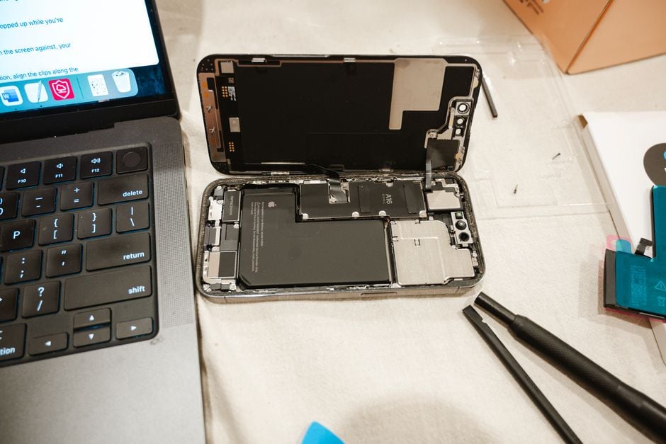close-up smartphone battery replacement toolkit tools