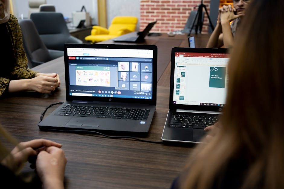 Arab startup team AI meeting laptop office