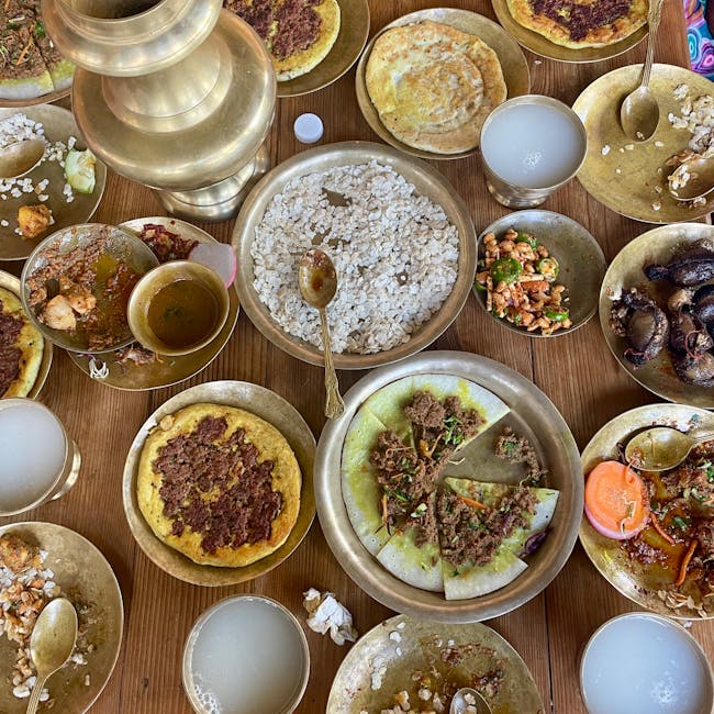 Nepali family serving traditional dal bhat to guests in homestay