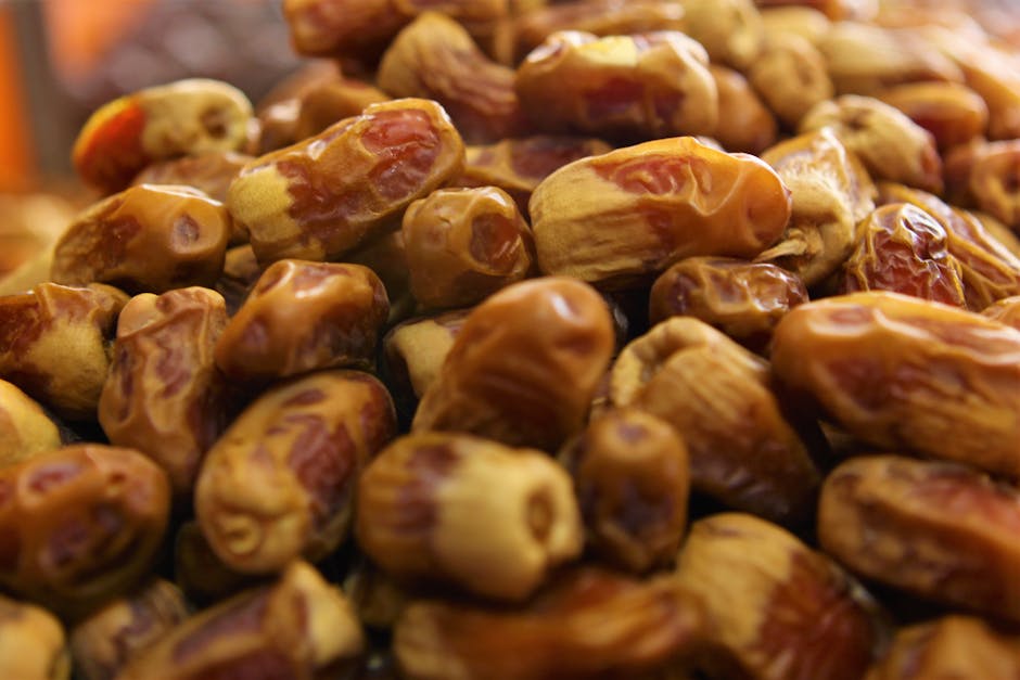 Close-up of fresh dates in Medine market, Saudi Arabia, highlighting their traditional cultural significance.