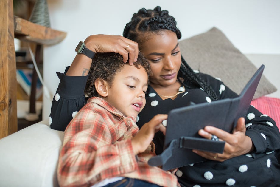 parent and child using AR educational toy tablet interactive STEM play 2025