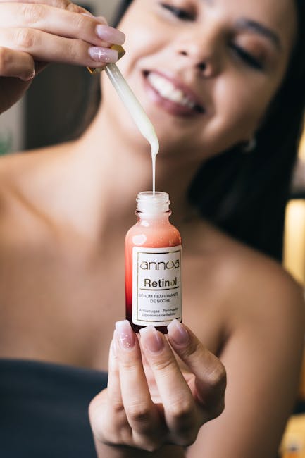 close-up applying serum face skincare retinol