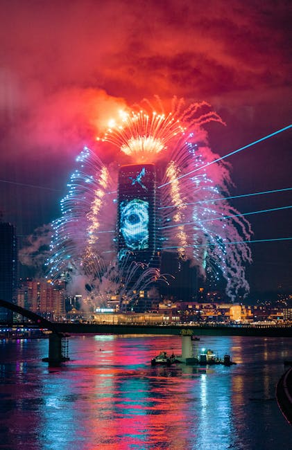 Stunning fireworks over Belgrade skyscraper illuminating the night sky. Perfect for festive and travel themes.